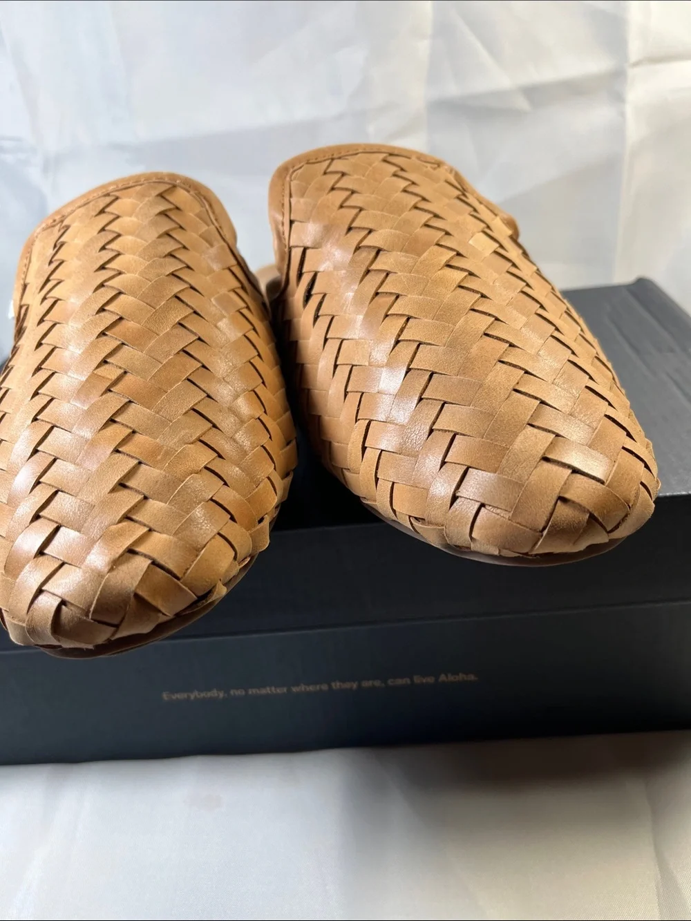 OluKai women’s Tan Woven Leather Slip-On Loafers
